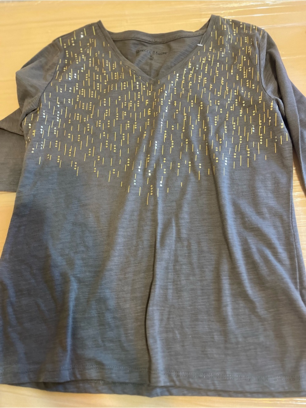 six assorted women's tops in different colors, styles